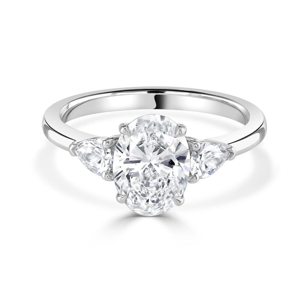 Oval Cut Platinum Trilogy Ring - David M Robinson