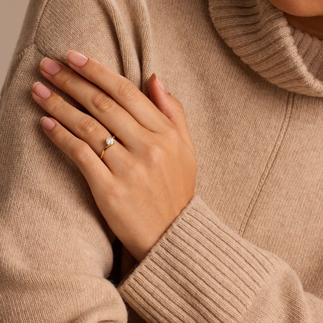 Signature Yellow Gold Round Brilliant Cut Diamond Solitaire Twist Ring